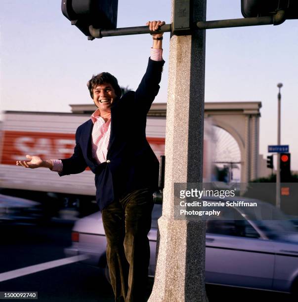 Co-founder of Rolling Stone Magazine, Jann Wenner, poses for a portrait across from Paramount Pictures Corporation on the corner of Melrose Avenue...