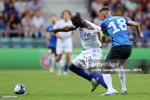 Romelu Lukaku of Belgium is challenged by Karol Mets of Estonia during the UEFA EURO 2024 qualifying round group E match between Estonia and Belgium...