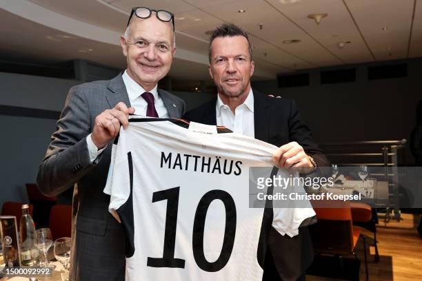 Bernd Neuendorf, DFB president hands out a jersey to Lothar Matthaeus during the DFB All-Stars meeting at Veltins Arena on June 20, 2023 in...