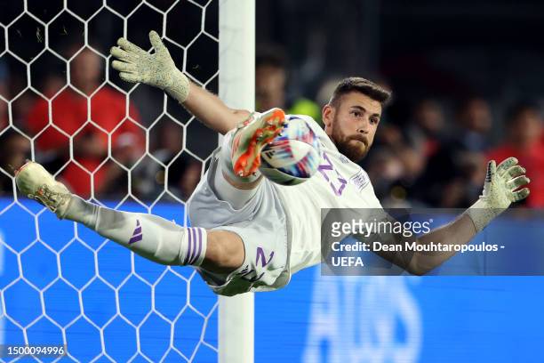 Unai Simon of Spain saves the fourth penalty from Lovro Majer of Croatia in the penalty shoot out during the UEFA Nations League 2022/23 final match...