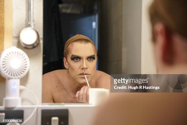 Stephen Webb prepares to go on stage to perform in the Rocky Horror Show fifty years after its world premier to about 60 people in London on June 19,...