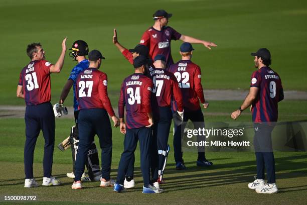 Michael Hogan of Kent celebrates with team mates after dismissing Harrison Ward of Sussex during the Vitality Blast T20 match between Sussex Sharks...