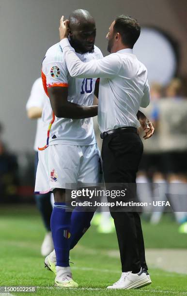 Romelu Lukaku of Belgium embraces Domenico Tedesco, Head Coach of Belgium, after being substitutted off during the UEFA EURO 2024 qualifying round...