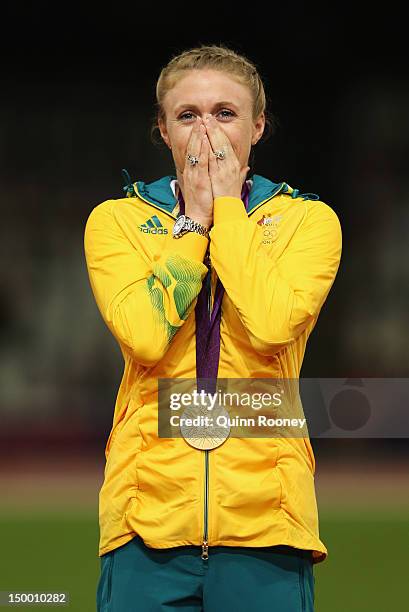 Gold medalist Sally Pearson of Australia poses on the podium during the medal ceremony for the Women's 100m Hurdles on Day 12 of the London 2012...