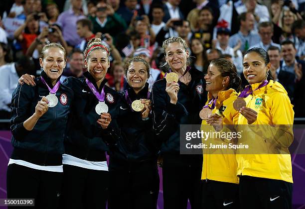 Silver medallists Jennifer Kessy and April Ross of the United States, Gold medallists Misty May-Treanor and Kerri Walsh Jennings, and Bronze...