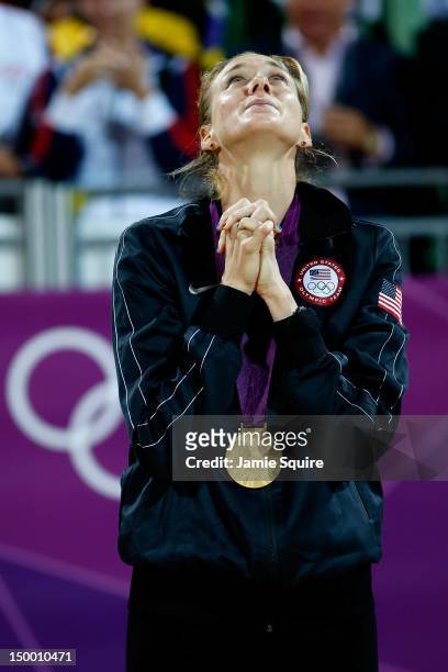 Gold medallist Kerri Walsh Jennings of the United States celebrates winning the Gold medal during the medal ceremony for the Women's Beach Volleyball...