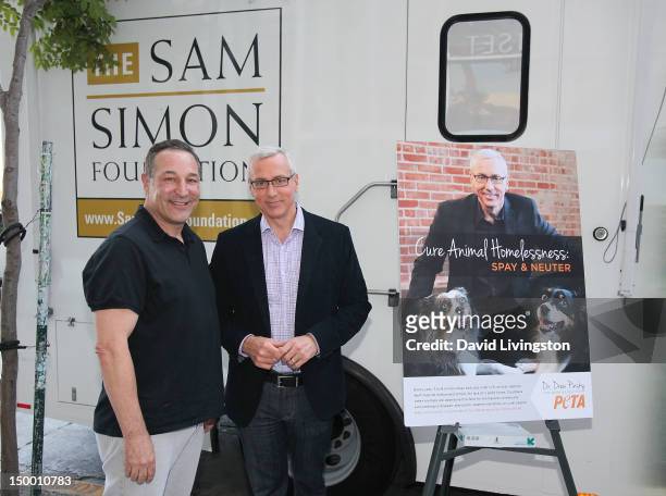 Writer Sam Simon and TV personality Dr. Drew Pinsky attend Pinsky's unveiling of a new PETA campaign to cure animal homelessness on August 8, 2012 in...