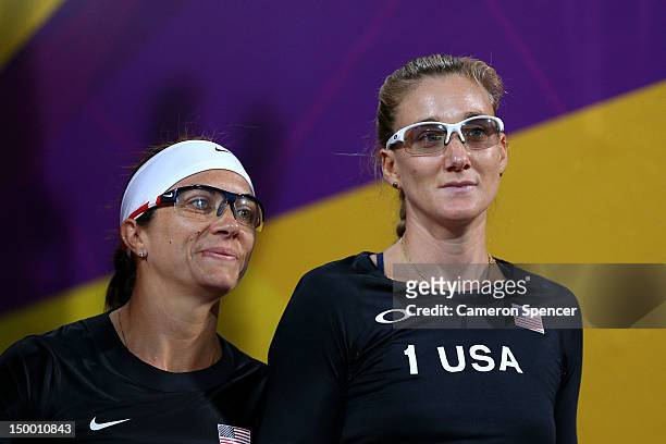 Misty May-Treanor and Kerri Walsh Jennings of the United States look on ahead of the Women's Beach Volleyball Gold medal match against the United...