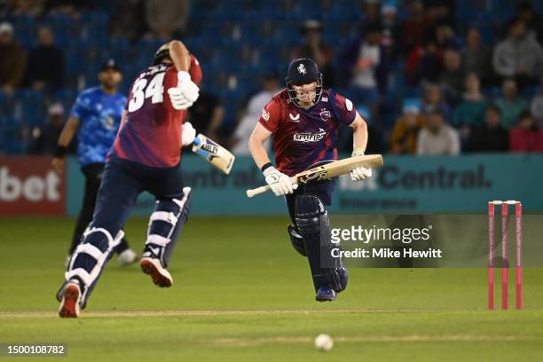 Jordan Cox and Jack Leaning of Kent run hard as they take their side to victory in the Vitality Blast T20 match between Sussex Sharks and Kent...