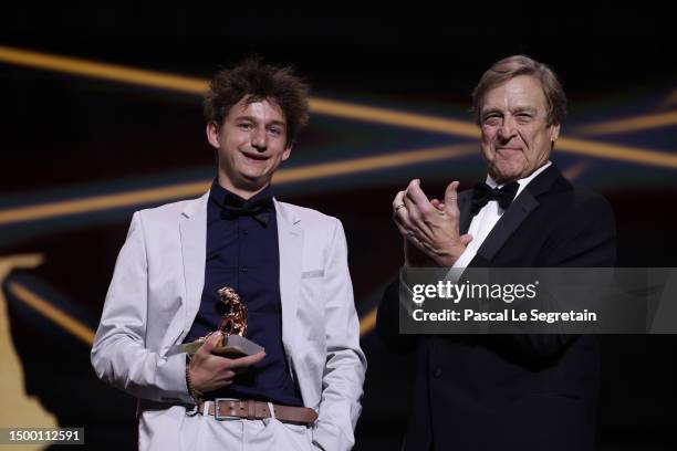 Timi-Joy Marbot and John Goodman attend the "Nymphes D'Or - Golden Nymphs" Award Ceremony during the 62nd Monte Carlo TV Festival on June 20, 2023 in...