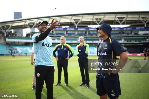 Chris Jordan of Surrey tosses the coin at the coin toss ahead of the Vitality Blast T20 match between Surrey CCC and Glamorgan at The Kia Oval on...