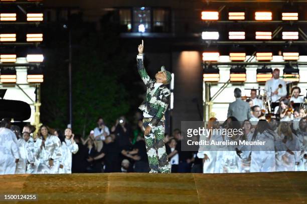 Louis Vuitton Men's Creative Director Pharrell Williams acknowledges the applause of the audience after the Louis Vuitton Menswear Spring/Summer 2024...