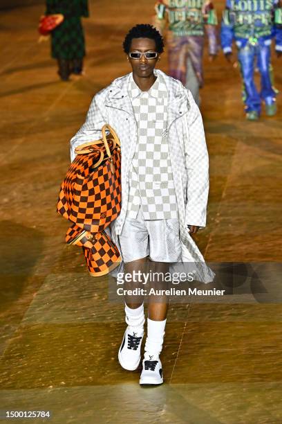 Model walks the runway during the Louis Vuitton Menswear Spring/Summer 2024 show as part of Paris Fashion Week on June 20, 2023 in Paris, France.