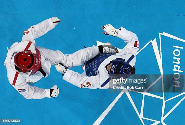 Lucija Zaninovic of Croatia competes against Jannet Alegria Pena of Mexico during the Women's -49kg Taekwondo bronze medal match on Day 12 of the...