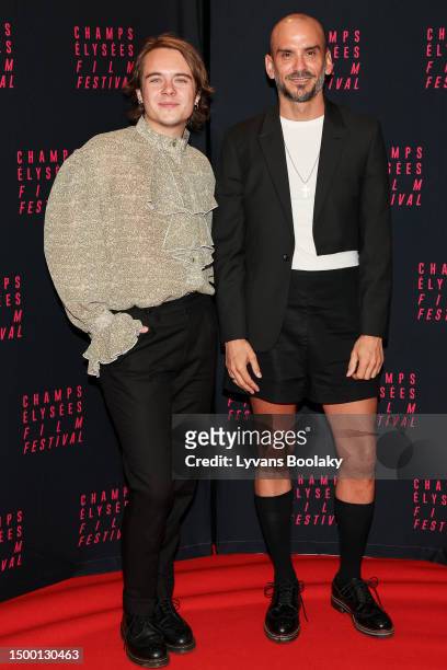 Vuk Lungelov-Klotz and a guest attend the opening ceremony photocall during the 12th Champs Elysees Film Festival at Cinema UGC Normandie on June 20,...