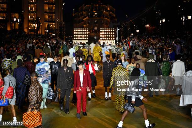 Models walk the runway during the Louis Vuitton Menswear Spring/Summer 2024 show finale as part of Paris Fashion Week on June 20, 2023 in Paris,...