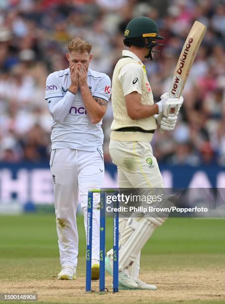 Ben Stokes of England reacts as he looks at Pat Cummins during Day 5 of the LV= Insurance Ashes 1st Test match between England and Australia at...