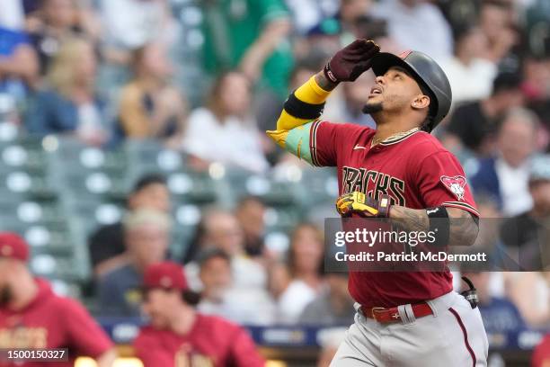 Ketel Marte of the Arizona Diamondbacks celebrates his three-run home run on the base paths against the Milwaukee Brewers in the second inning at...