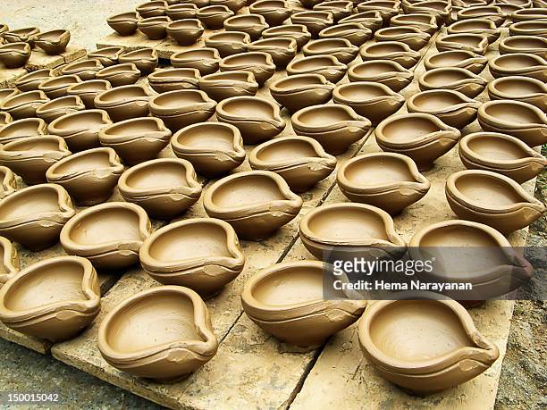 clay lamps - hema narayanan stock pictures, royalty-free photos & images