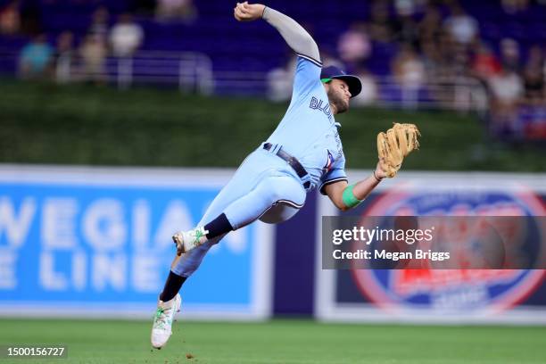 Bo Bichette of the Toronto Blue Jays throws to first base against the Miami Marlins during eighth inning at loanDepot park on June 20, 2023 in Miami,...