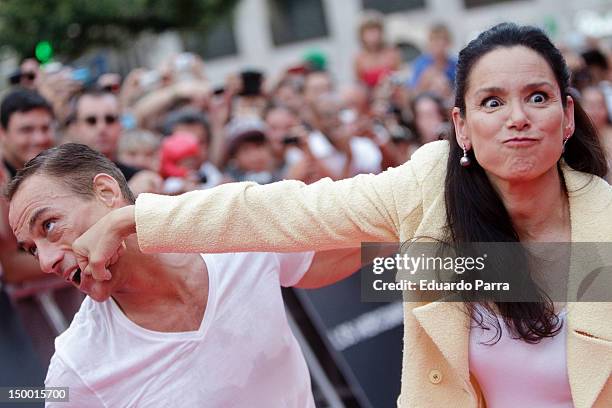 Jean-Claude Van Damme and his wife Gladys Portugues attend 'The Expendables 2' at Callao cinema on August 8, 2012 in Madrid, Spain.