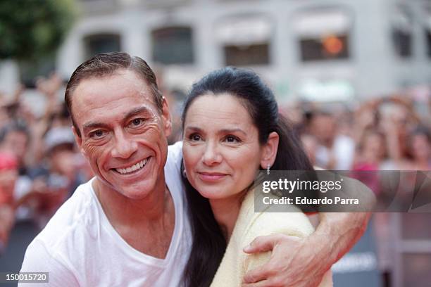 Jean-Claude Van Damme and his wife Gladys Portugues attend 'The Expendables 2' at Callao cinema on August 8, 2012 in Madrid, Spain.