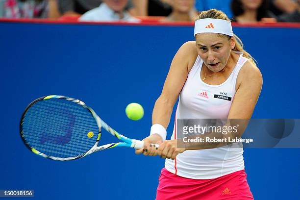 Ksenia Pervak of Kazakhstan returns to Petra Kvitova of the Czech Republic during round two of the Rogers Cup at the Uniprix Stadium on August 8,...