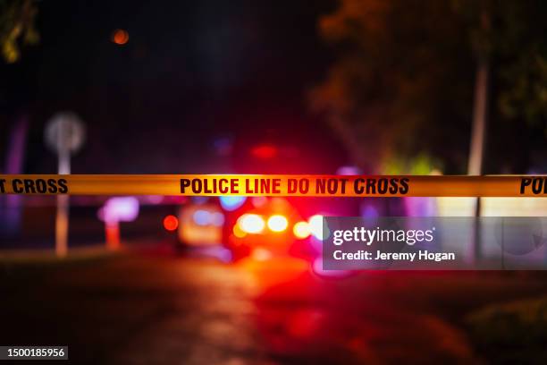 police investigate shooting - police car lights stock pictures, royalty-free photos & images