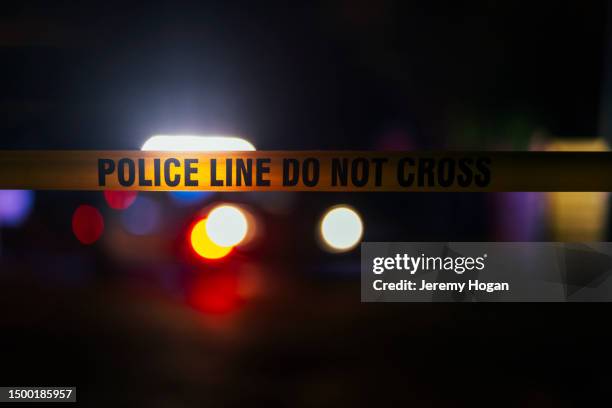 police investigate shooting - police light stock pictures, royalty-free photos & images