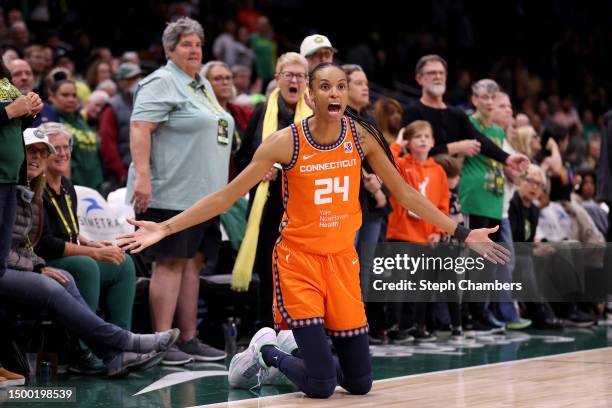 DeWanna Bonner of the Connecticut Sun looks for a foul during the fourth quarter against the Seattle Storm at Climate Pledge Arena on June 20, 2023...