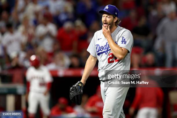 Clayton Kershaw of the Los Angeles Dodgers looks on after finishing the seventh inning of a game against the Los Angeles Angels at Angel Stadium of...