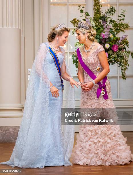Queen Mathilde of Belgium and Queen Maxima of The Netherlands during the state banquet at Laeken Castle on June 20, 2023 in Brussels, Belgium. The...