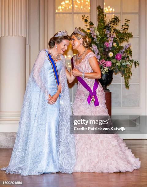 Queen Mathilde of Belgium and Queen Maxima of The Netherlands during the state banquet at Laeken Castle on June 20, 2023 in Brussels, Belgium. The...