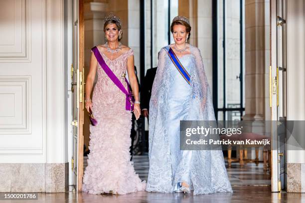 Queen Mathilde of Belgium and Queen Maxima of The Netherlands during the state banquet at Laeken Castle on June 20, 2023 in Brussels, Belgium. The...