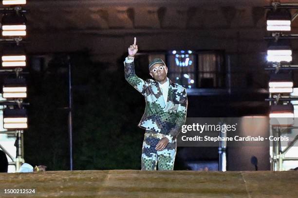 Fashion designer and singer Pharrell Williams walks the runway during the Louis Vuitton Menswear Spring/Summer 2024 show as part of Paris Fashion...