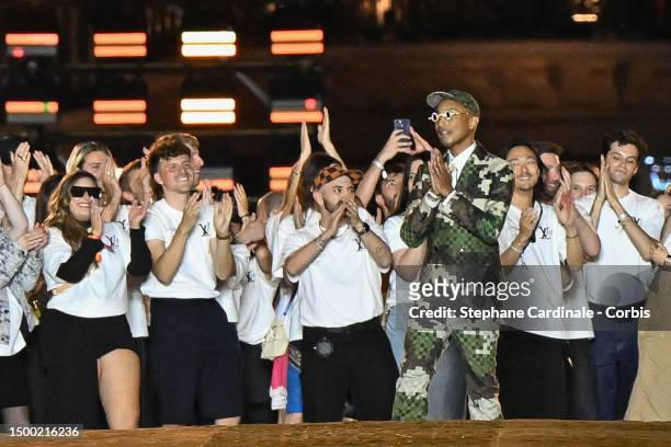 Fashion designer and singer Pharrell Williams walks the runway during the Louis Vuitton Menswear Spring/Summer 2024 show as part of Paris Fashion...