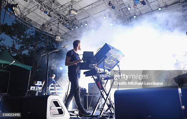 Musician Anthony Gonzalez of M83 performs at Central Park SummerStage on August 8, 2012 in New York City.