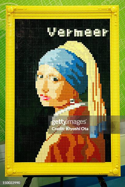Replica of Johannes Vermeer's 'Girl with a Pearl Earring' built with Lego bricks is displayed during an event in collaboration with the 'Masterpieces...