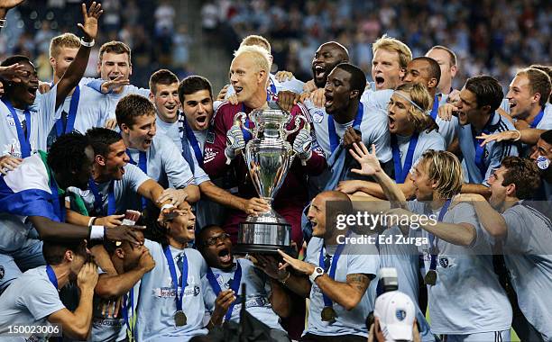 Members of Sporting Kansas City celebrate after defeating the Seattle Sounders FC to win the Lamar Hunt US Open Cup Final at Livestrong Sporting Park...