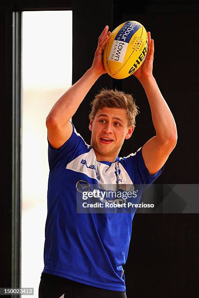 Kieran Harper takes a mark during a North Melbourne Kangaroos AFL media session at Aegis Park on August 9, 2012 in Melbourne, Australia.