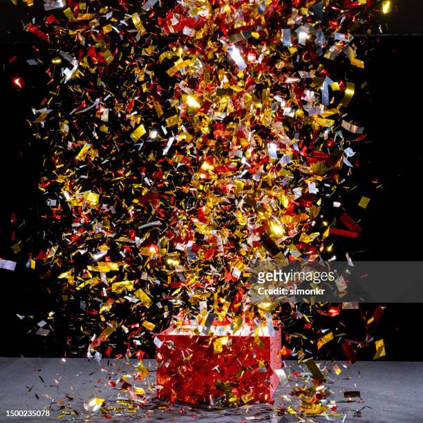 exploding confetti - exploding box stock pictures, royalty-free photos & images