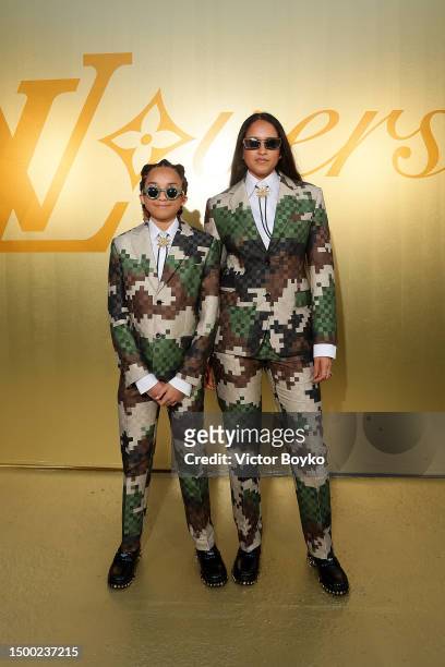Rocket Williams and Helen Lasichanh attend the Louis Vuitton Menswear Spring/Summer 2024 show as part of Paris Fashion Week on June 20, 2023 in...