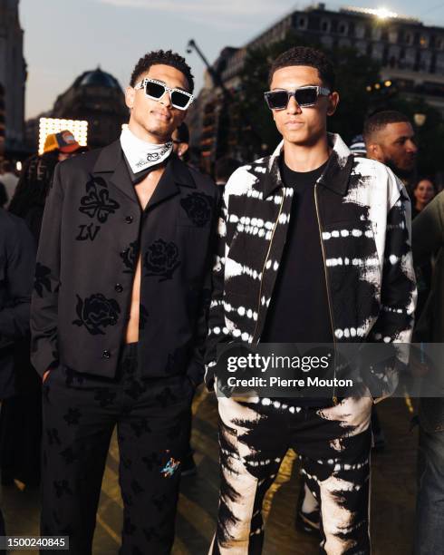 Jude Bellingham and Jobe Bellingham attends the the Louis Vuitton Menswear Spring/Summer 2024 show as part of Paris Fashion Week on June 20, 2023 in...