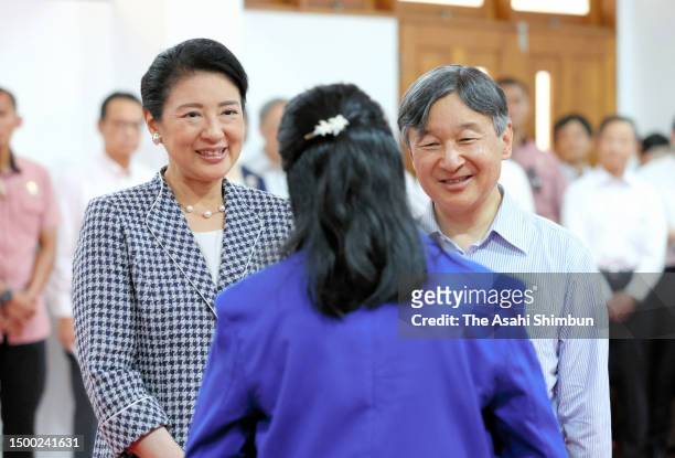 Emperor Naruhito and Empress Masako talk with students studying Japanese at Darma Persada University on June 20, 2023 in Jakarta, Indonesia.