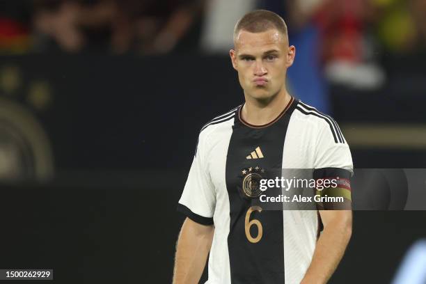 Joshua Kimmich of Germany reacts after the international friendly match between Germany and Colombia at Veltins-Arena on June 20, 2023 in...