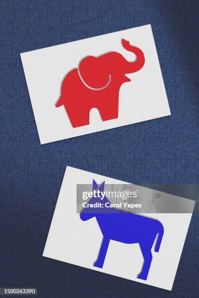 democratic blue donkey and republican red elephant - democratic party stock pictures, royalty-free photos & images