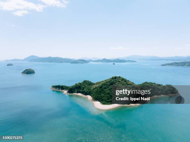 aerial view of deserted island in seto inland sea, hiroshima, japan - einsame insel stock-fotos und bilder