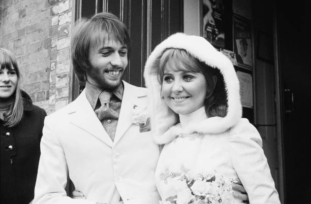 Maurice Gibb, of the Bee Gees, and his wife Lulu leaving St James's Church after their wedding in Gerrards Cross, Buckinghamshire, 18th February 1969.