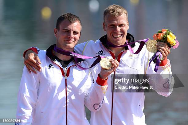 Peter Kretschmer and Kurt Kuschela of Germany celebrate winning the Gold medal during the medal ceremony for the Men's Kayak Double 1000m Canoe...