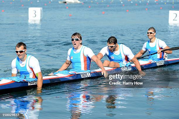 Daniel Havel, Lukas Trefil, Jan Sterba and Josef Dostal of Czech Republic celebrate winning the bronze medal in the Men's Kayak Four 1000m Canoe...